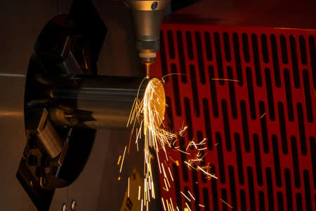The fiber laser cutting machine cutting  machine cut the metal tube. The hi-technology sheet metal...