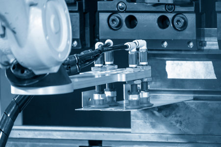The high technology sheet metal forming by robotic arm with hydraulic press brake machine. The sheet...