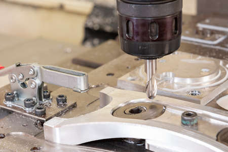 The aluminum automotive part manufacturing process by CNC milling machine with ball end mill tool....