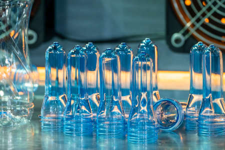 The close up scene of group of preform shape of PET bottle products. The raw material for plastic bottle manufacturing process.の写真素材