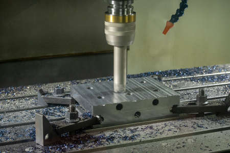 The CNC milling machine rough cutting the injection mold parts by indexable tools. The mold and die...