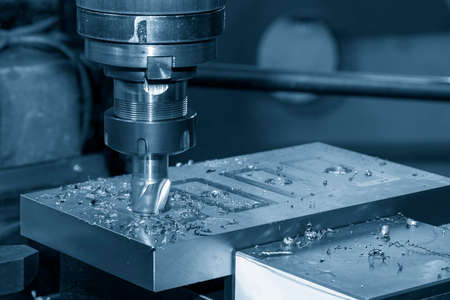 The milling process on NC milling machine. The metal working concept on the milling machine.