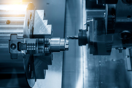 The multi-tasking CNC lathe machine  milling cut the metal shaft parts by milling turret. The high...