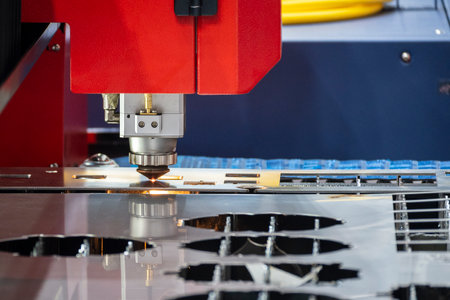 Close-up scene the fiber laser cutting machine cutting  machine cut the metal plate. The...