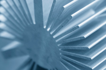 Close up scene the sample parts of aluminum profile extrusion manufacturing concept. The circular shape of aluminum heat sink profile.の写真素材