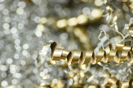 Close-up scene of  the metal materials scrap from turning process. The pile of lathe chips.の写真素材