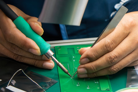 Close up scene the soldering operation by skill operator. The repair work circuit board by skill...