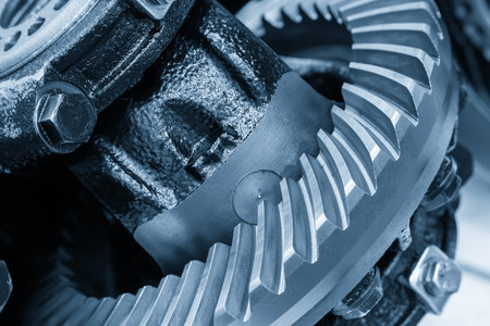 Close up scene the differential gear parts in the light blue scene. The automotive gear box manufacturing process concept.の写真素材