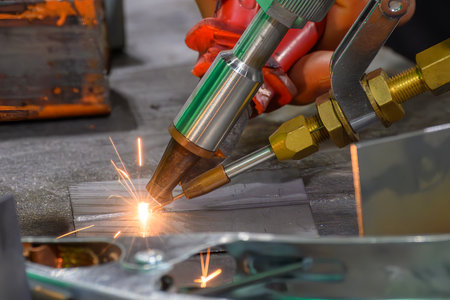 Close up scene the laser welding process by robotic system . The high technology welding process by laser welding machine.の写真素材