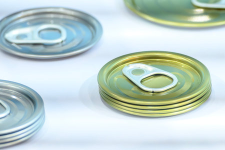 Close up scene the aluminum can lid on the white background.  The canned food packaging manufacturing  concepts.の写真素材