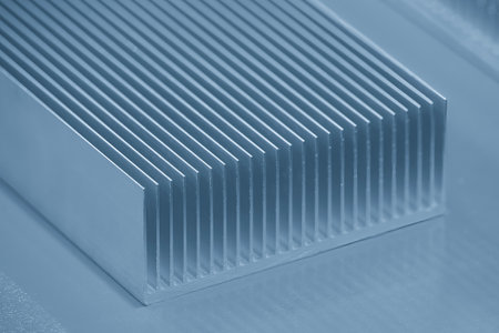 The aluminum heat sink parts in the light blue scene.  Close up scene the profile extrusion manufacturing concept.の写真素材