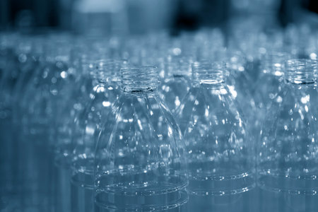 The group of drinking water bottles in the light blue scene. The hi-technology of drinking water...