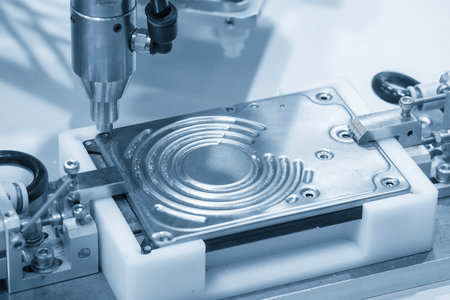 The hard disk assembly process by automatic screw driver in the blue tone scene. The hard drive mass...