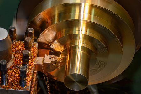 The finishing turning process on a workpiece made of brass or premium copper alloy using a lathe...