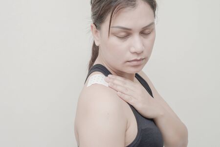 Women Neck, shoulder pain and sticking plaster.の写真素材