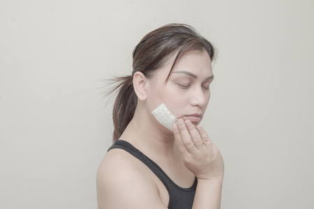 Women Teeth, jaw pain and sticking plaster.の写真素材