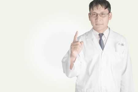 Asian Doctor on white. The concept of good health.の写真素材