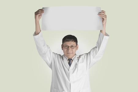 Asian Doctor on white. The concept of good health.の写真素材