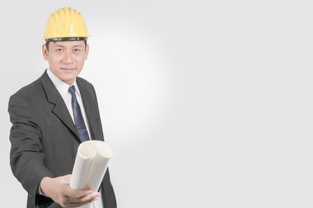 Asian man engineers and yellow safety hat.の写真素材