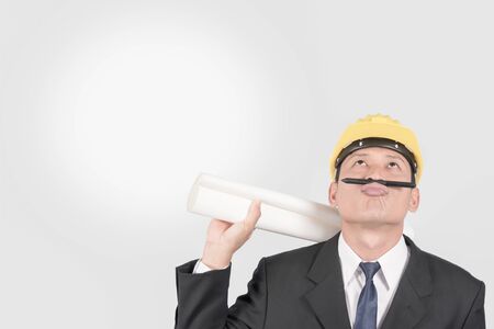 Asian man engineers and yellow safety hat.の写真素材