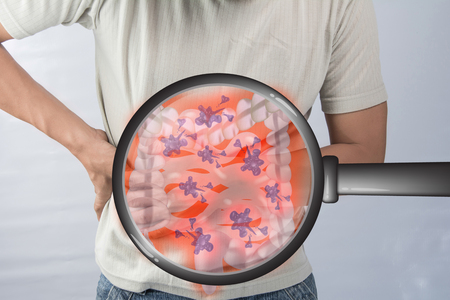 Body disease and cancer.Use a magnifying glass concept to add interest.の写真素材