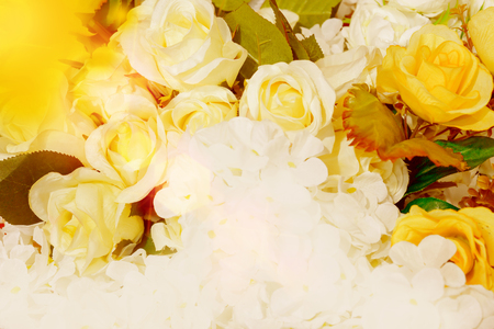 Flowers from beautiful decorative fabric for the backdrop.Light yellow, light and sun.の写真素材