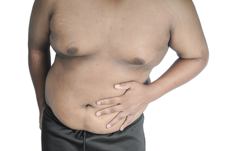 man squeeze belly fat wearing.
The internal organs are too fat.の写真素材