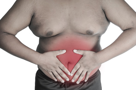 man squeeze belly fat wearing.
The internal organs are too fat.の写真素材