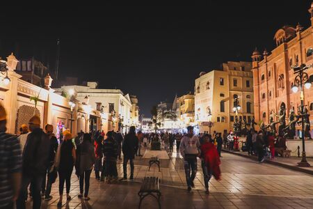 street filled with people and lights illuminated at night in amritsarの写真素材