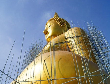 Golden Buddha Statue Under Constructionの写真素材