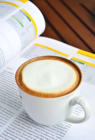 Coffee Cup On Annual Reportの写真素材