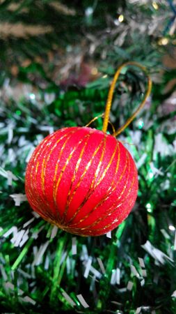 Red Ball Decorated on Christmas Treeの素材