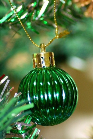 Green Ball Decorated on Christmas Treeの素材