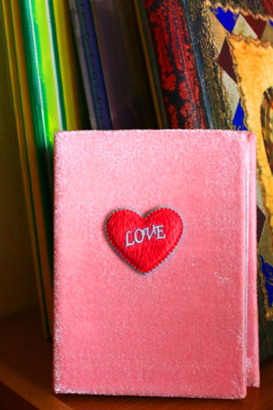 Pink photo album with loveの写真素材