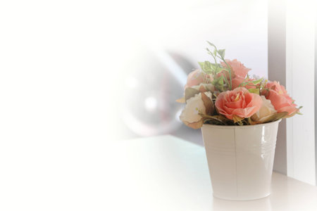 Vase of roses on the terraceの写真素材