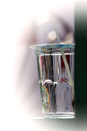 Cups of water on blur backgroundの写真素材