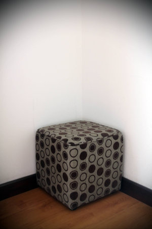 Stool chair in room cornerの写真素材