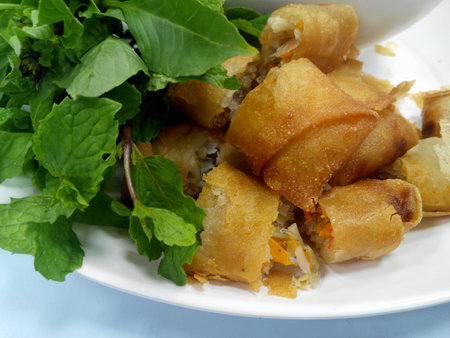 Deep fried spring rolls and fresh vegetable