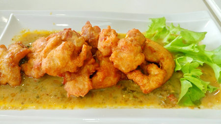 Green curry with chicken milaneseの写真素材