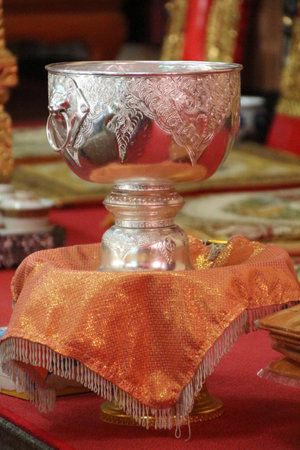 Silver bowl on the gold cover