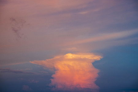 CUMULONIMBUS cloud in sunset background for forecast and meteorology conceptの写真素材