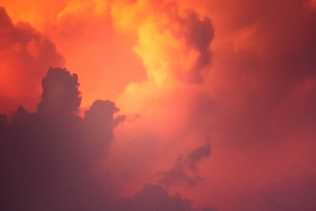 CUMULONIMBUS cloud in sunset background for forecast and meteorology conceptの写真素材