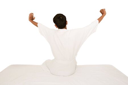 wake up and stretching in morning with white background andの写真素材