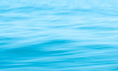 Smooth surface wave in ocean Use techniques panning and low shutter speeds