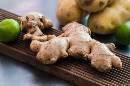 Ginger and lime on the woodの写真素材