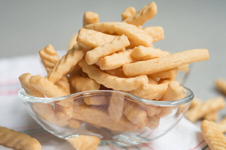 Crunchy prawn crackers in a glass cupの写真素材