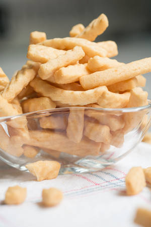 Crunchy prawn crackers in a glass cupの写真素材