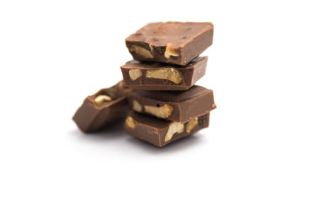 Group of cookie and nut chocolate on isolated white backgroundの写真素材
