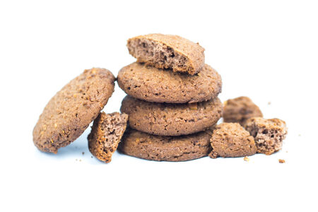 Stack of chocolate cookies isolated on white