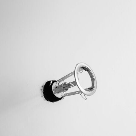 Broken light socket on hang out of the ceiling